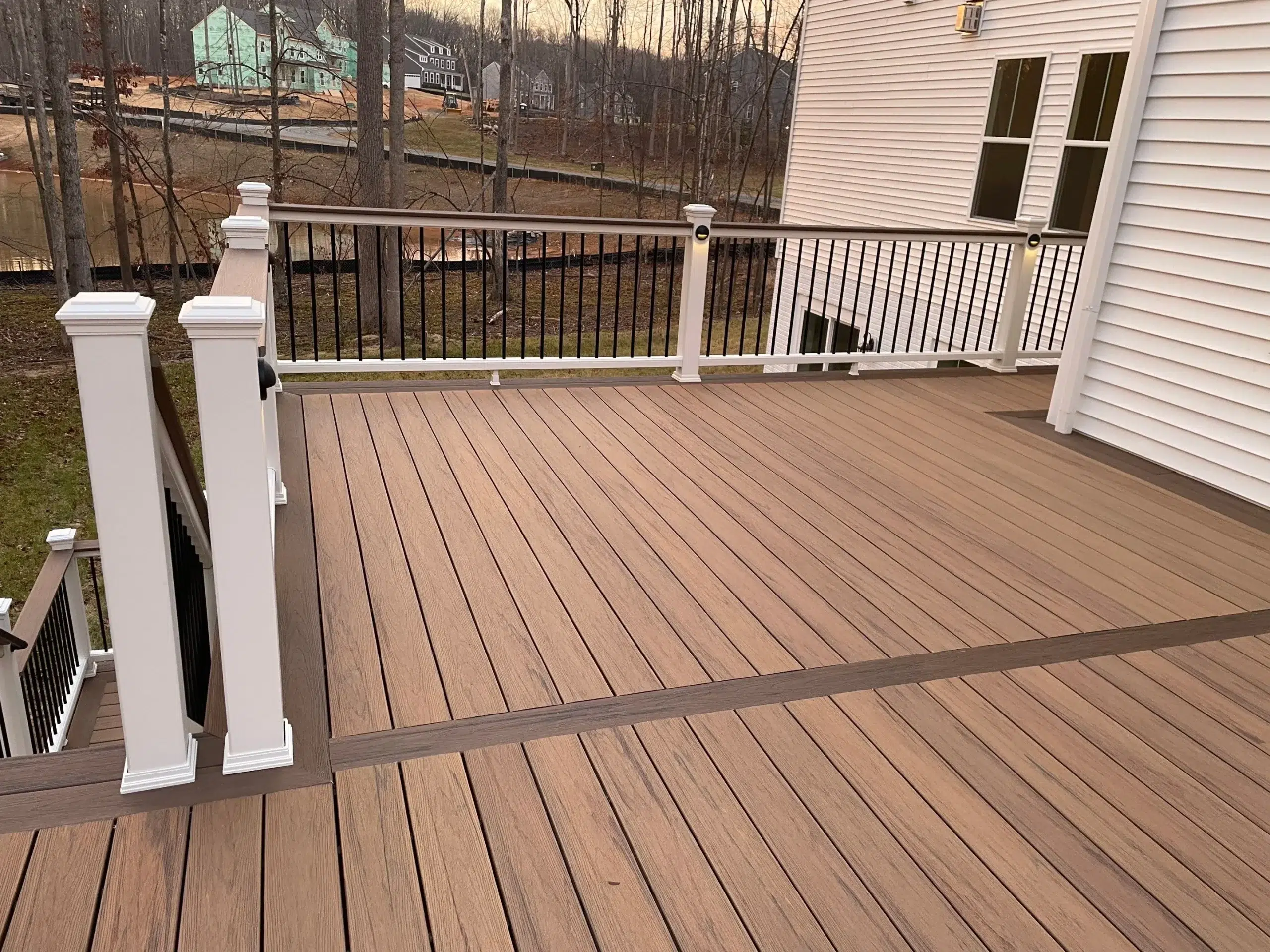 Composite deck with post lighting