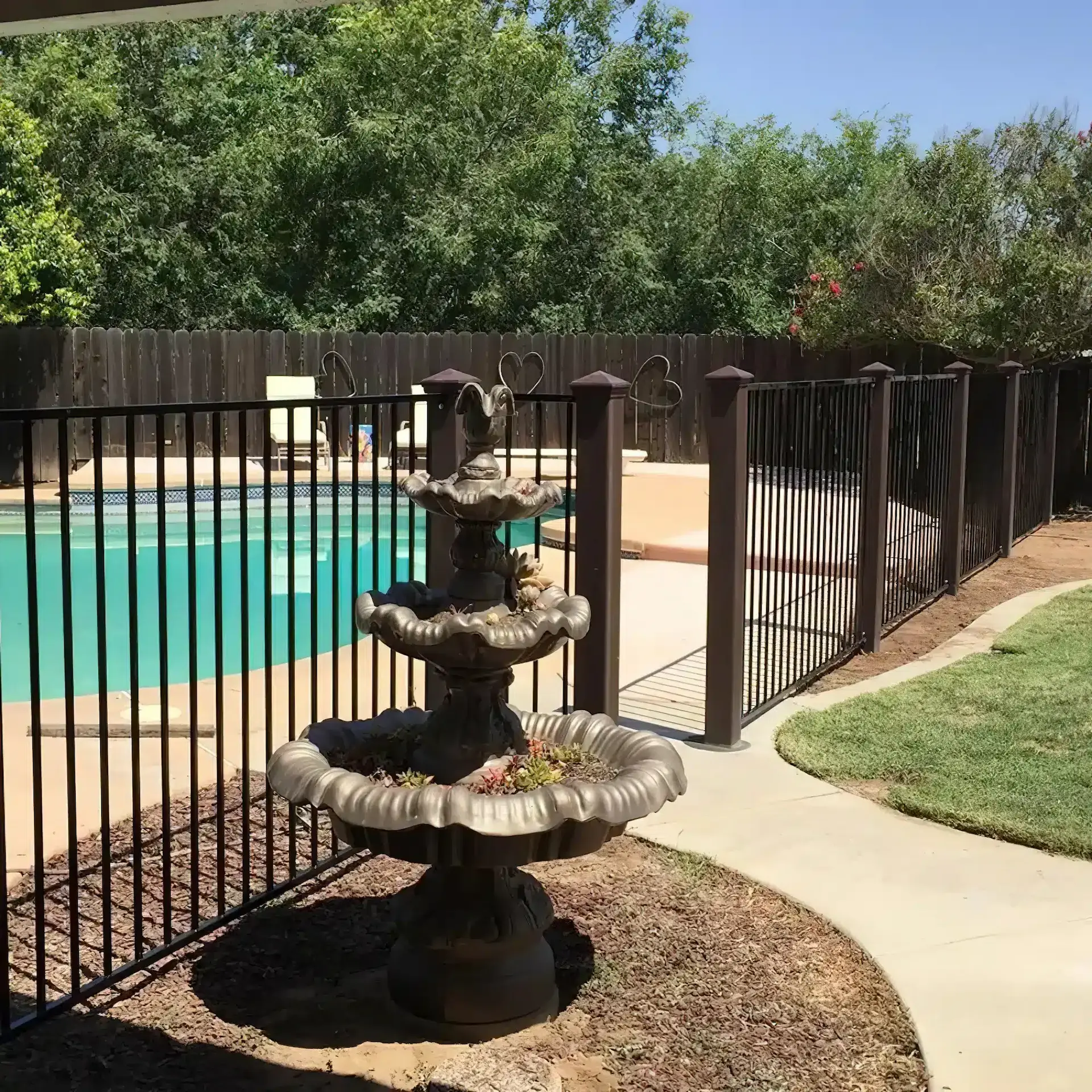 fence-posts-with-ornamental-fence-panels-for-a-pool-on-the-virginia