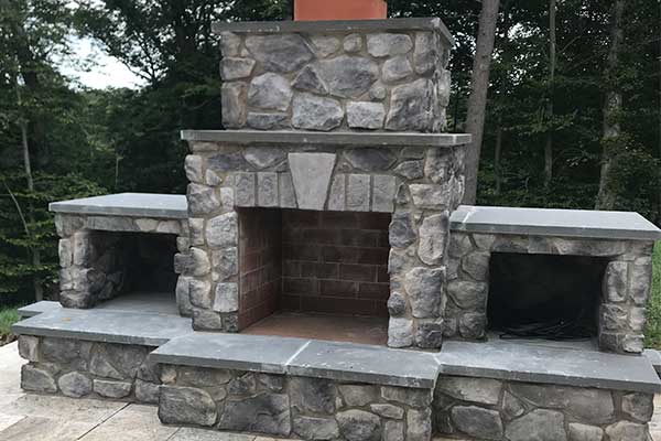 patio-with-stone-fireplace-and-firepit-on-the-dumfries-virginia